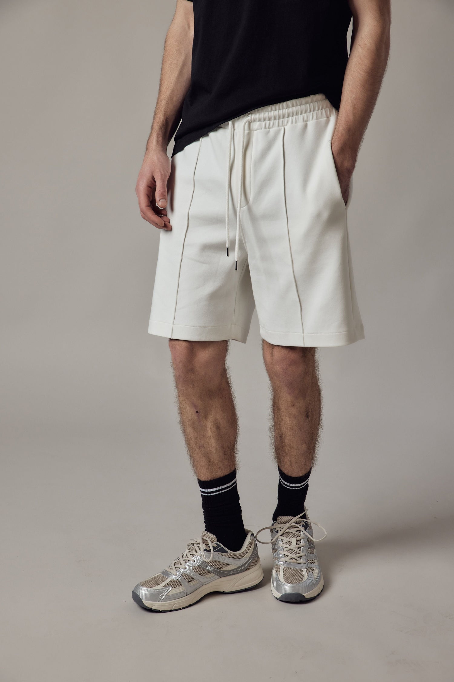 Pantaloncino Loose Fit Interlock-kuosissa