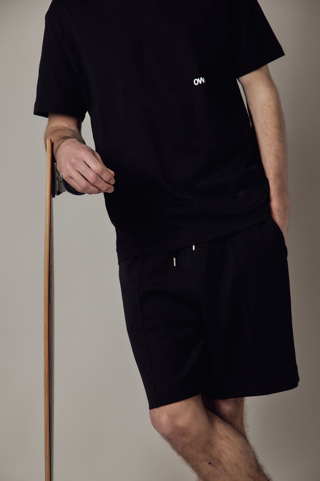 Pantaloncino Loose Fit Interlock-kuosissa