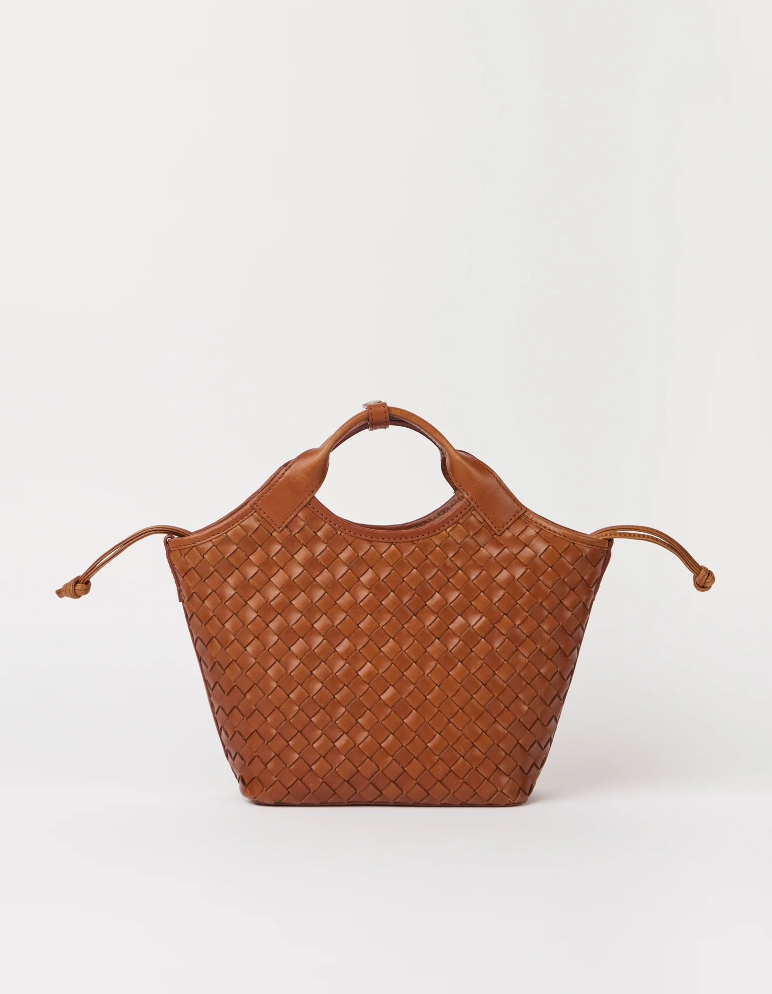 Brown woven handbag on a white background