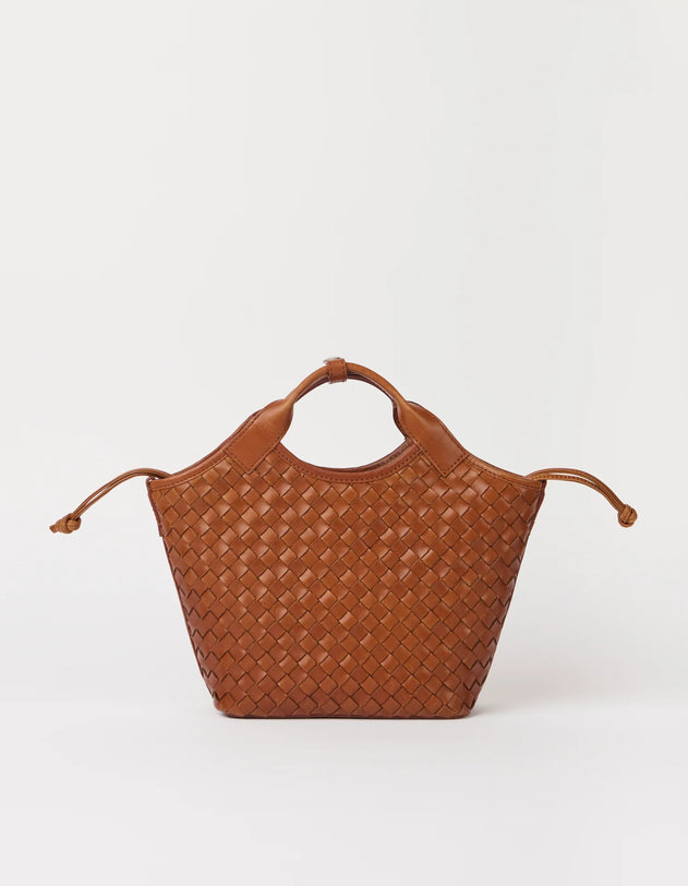 Brown woven handbag on a white background