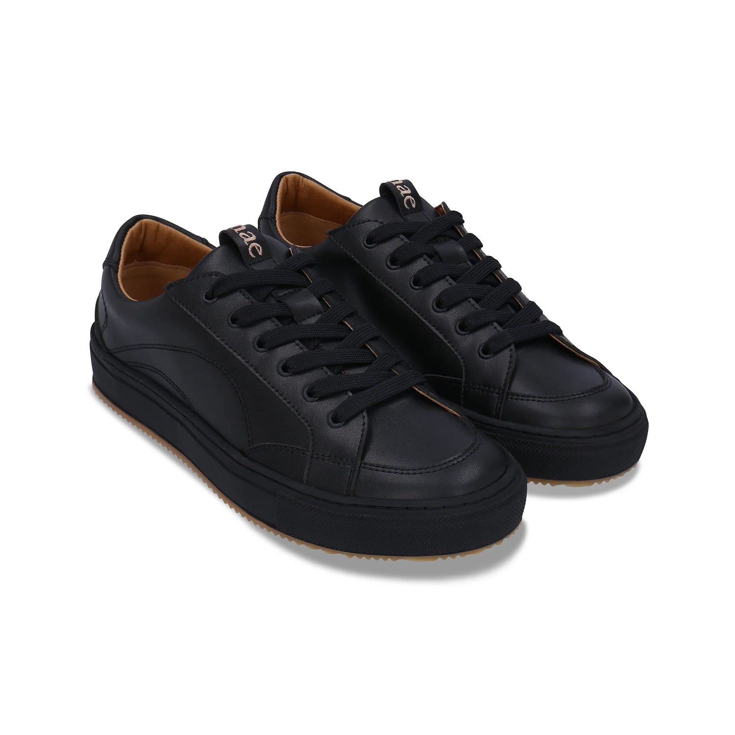 Pair of black sneakers on a white background