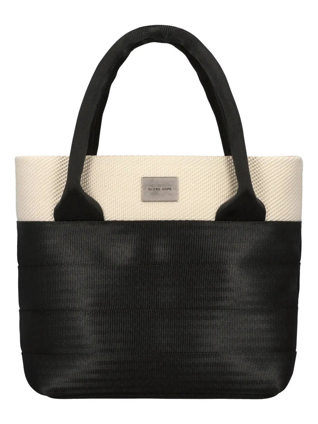 Black and beige tote bag with a visible brand label on a white background