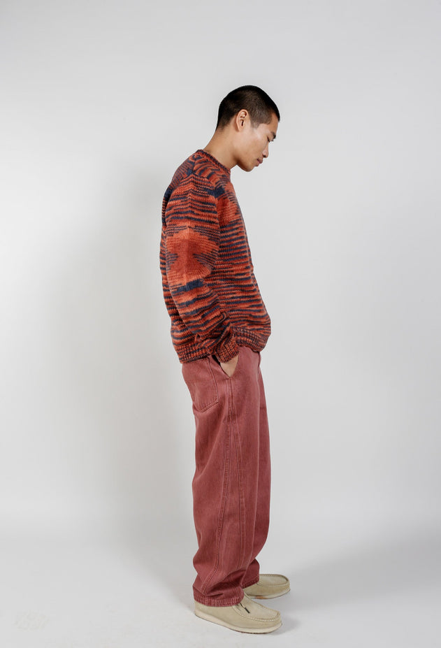 Man wearing Komodo Temura red sweater