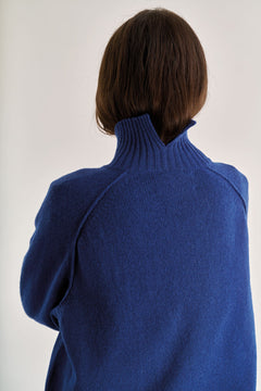 Komodo navy merino wool top, back view