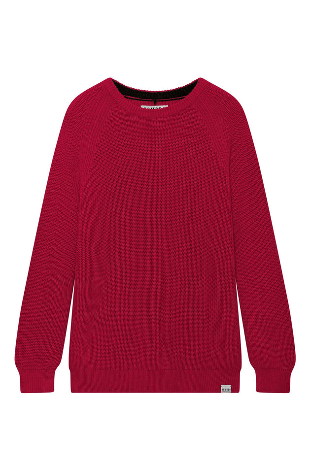 Woman wearing Komodo red organic cotton rib knit jumper