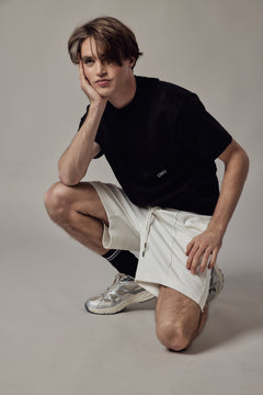 Pantaloncino Loose Fit Interlock-kuosissa