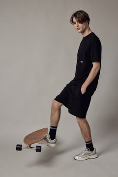 Pantaloncino Loose Fit Interlock-kuosissa