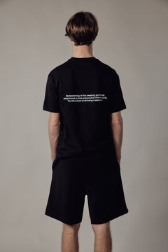 Pantaloncino Loose Fit Interlock-kuosissa