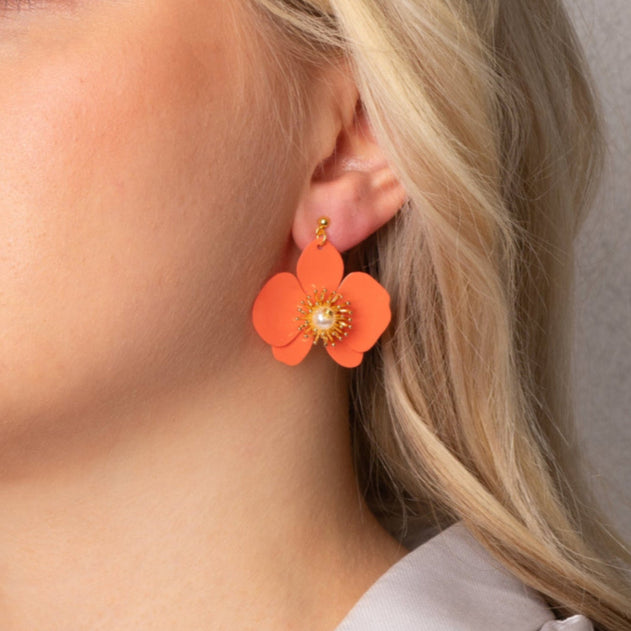 butterfly-orchid-stud-earrings-s-papaya-orange--model.jpg?v=1743709857