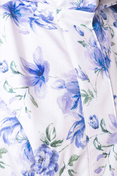 rainsisters-coat-floral-white-waterproof-white-floral-close-up.jpg?v=1779052631
