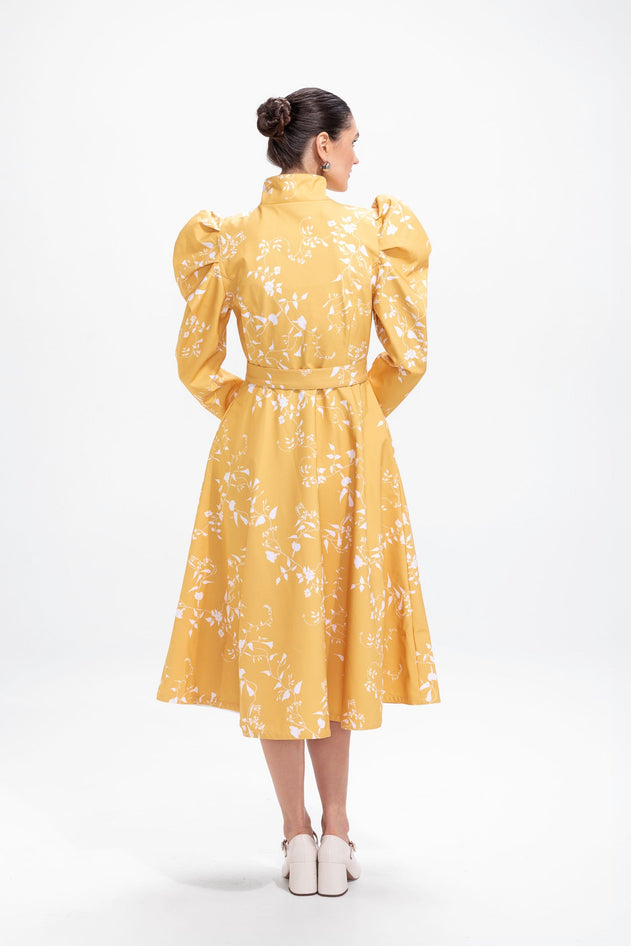 rainsisters-coat-majestic-yellow-waterproof-yellow-floral-back.jpg?v=1779054614