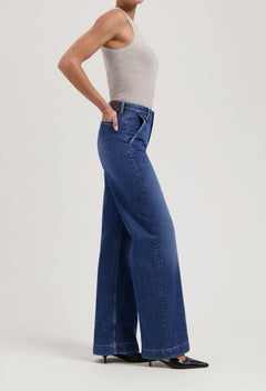 women-sustainable-jeans-june-mid-loose-fresh-fade-full-body-side-summer.jpg?v=1747398379