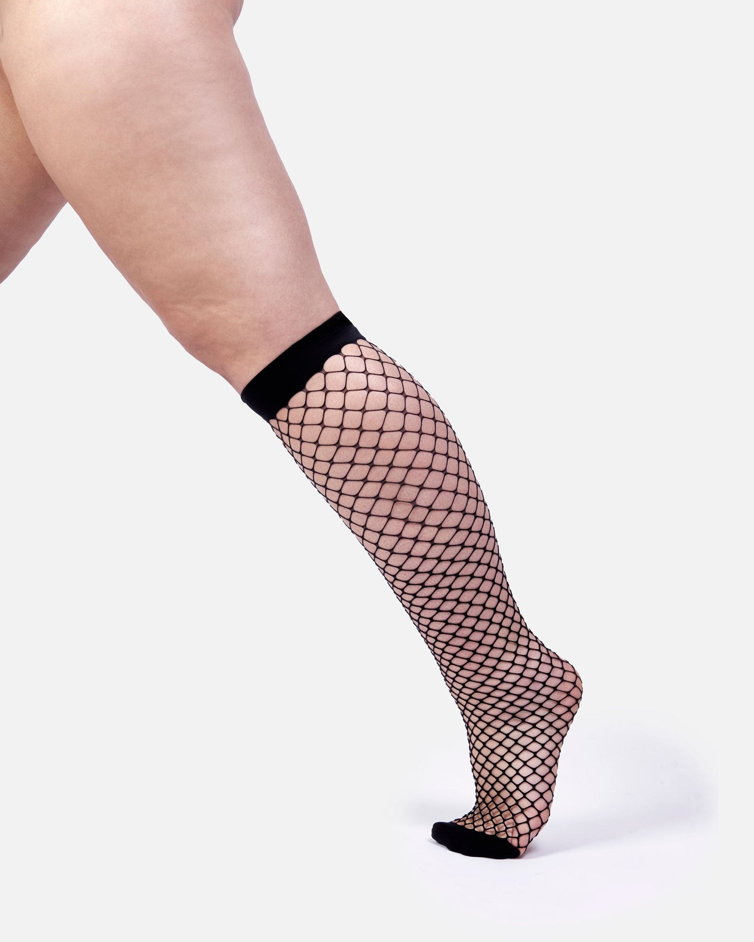 The Untamed Fishnet Knee High Socks